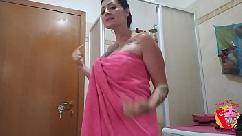 Horny tattoed mom gets filmed under the shower